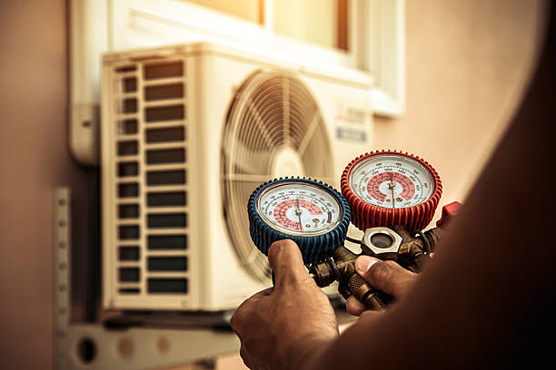 Professional Ac Installation technician working in Woodville, MA